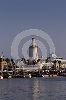 White Lighthouse in a Harbour on a Sunny Evening