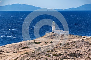 White lighthouse in Prasonisi National Park â€“ southest spot of Island Rhodes, Greece