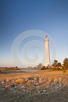 White lighthouse and stone labyrinth
