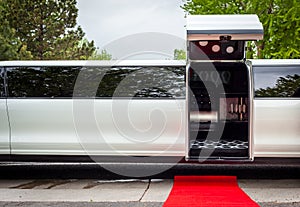 White limousine with inviting open door