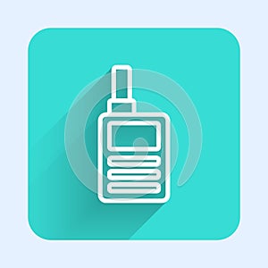 White line Baby Monitor Walkie Talkie icon isolated with long shadow. Green square button. Vector