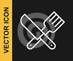 White line Crossed knife and fork icon isolated on black background. Cutlery symbol. Vector