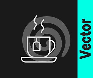 White line Cup of tea with tea bag icon isolated on black background. Vector