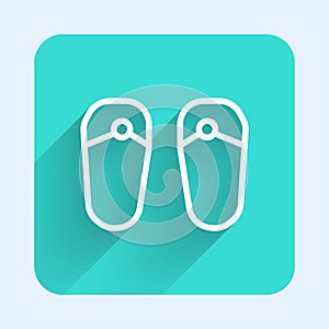 White line Flip flops icon isolated with long shadow. Beach slippers sign. Green square button. Vector
