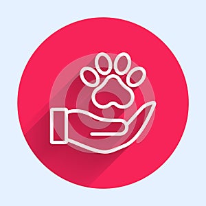 White line Hands with animals footprint icon isolated with long shadow background. Pet paw in heart. Love to the animals