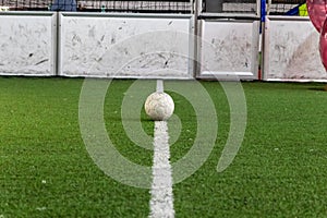 White line on indoor soccer field with football on the playground is ready for kick off as tournament or training