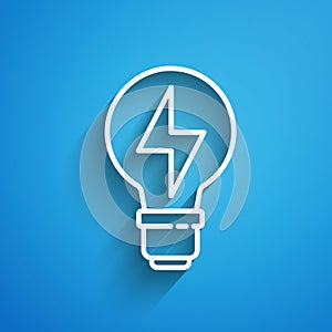 White line Light bulb with lightning symbol icon isolated on blue background. Light lamp sign. Idea symbol. Long shadow