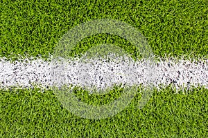 The white Line marking on the artificial green grass footbal, soccer field photo