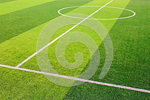 The white Line marking on the artificial green grass soccer field