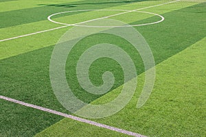 The white Line marking on the artificial green grass soccer field