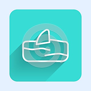 White line Shark fin in ocean wave icon isolated with long shadow. Green square button. Vector