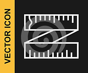 White line Tape measure icon isolated on black background. Measuring tape. Vector