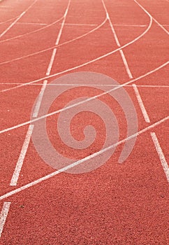 White lines and texture of running racetrack, red rubber racetracks in small stadium