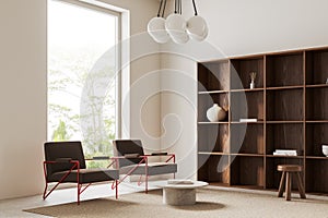 White living room corner with armchairs