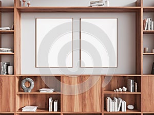 White living room interior with dresser and posters