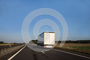White lorry on an open road