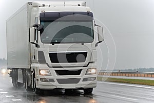 White lorry during the rain