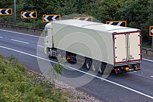 White lorry travelling on motorway