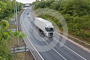 White lorry travelling on motorway