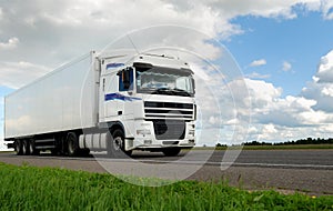 White lorry with white trailer
