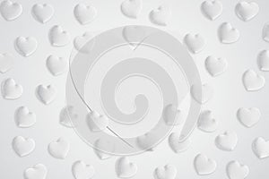 White love heart shaped textured paper for copy space and white fabric love hearts