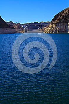 White low water level strip on red cliffs of Lake Mead entering Hoover Dam