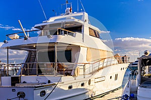 White luxury yacht in a sea harbor of Hurghada, Egypt. Marina with tourist boats on Red Sea