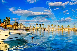 White luxury yachts in a sea harbor of Hurghada, Egypt. Marina with tourist boats on Red Sea