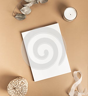 White magazine cover mockup and various decor