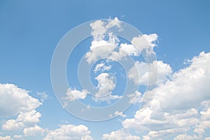 White magnificent cumulus clouds on a blue sky,