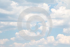 White magnificent cumulus clouds on a blue sky,