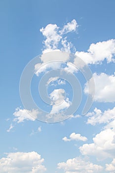White magnificent cumulus clouds on a blue sky,