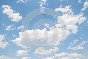 White magnificent cumulus clouds on a blue sky,