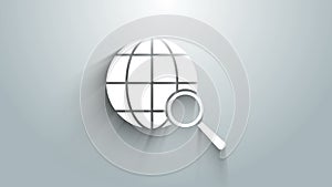 White Magnifying glass with globe icon isolated on grey background. Analyzing the world. Global search sign. 4K Video
