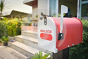 White Mail Box in Front of a House