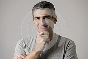 White man 40 to 50 years old smiling happy showing nice and positive face expression isolated on grey background