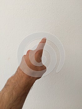White man`s finger shows direction