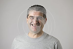 White man 40 to 50 years old smiling happy showing nice and positive face expression isolated on grey background