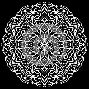 White mandala design over black background