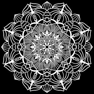 White mandala design over black background