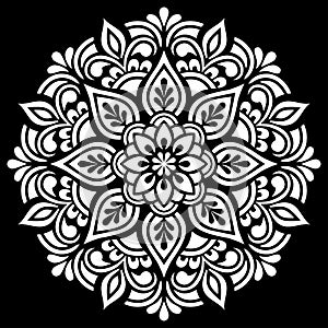 White mandala pattern on black stencil doodles sketch