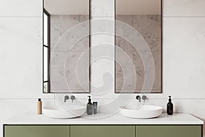 White marble bathroom interior with double sink