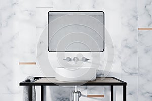 White marble bathroom sink close up