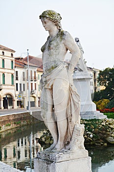 Romantic white marble statue, building in Castelfranco Veneto, in Italy