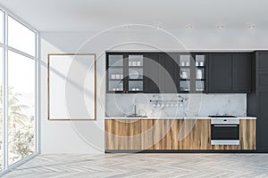 White marble and gray kitchen with poster