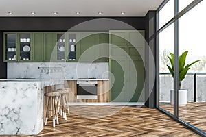 White marble and green kitchen, bar and balcony