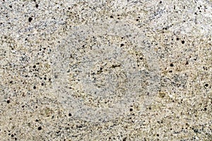 White marble rock texture with dark red minerals