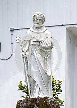 White marble sculpture of Saint Benedict at St. Benedicts Painted Church on the Big Island, Hawaii.