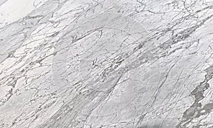 white marble stone with light veins calacatta photo