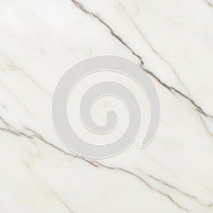 White marble surface featuring subtle gray and beige veining patterns